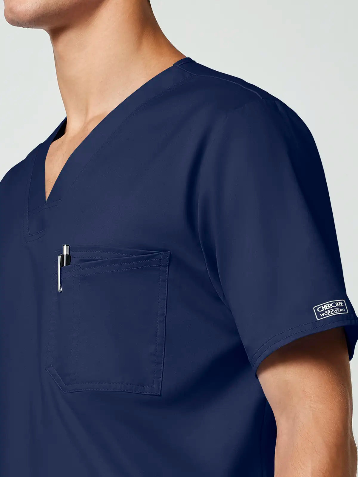 Casaca sanitaria con cuello pico hombre Cherokee Core Stretch WWE4743