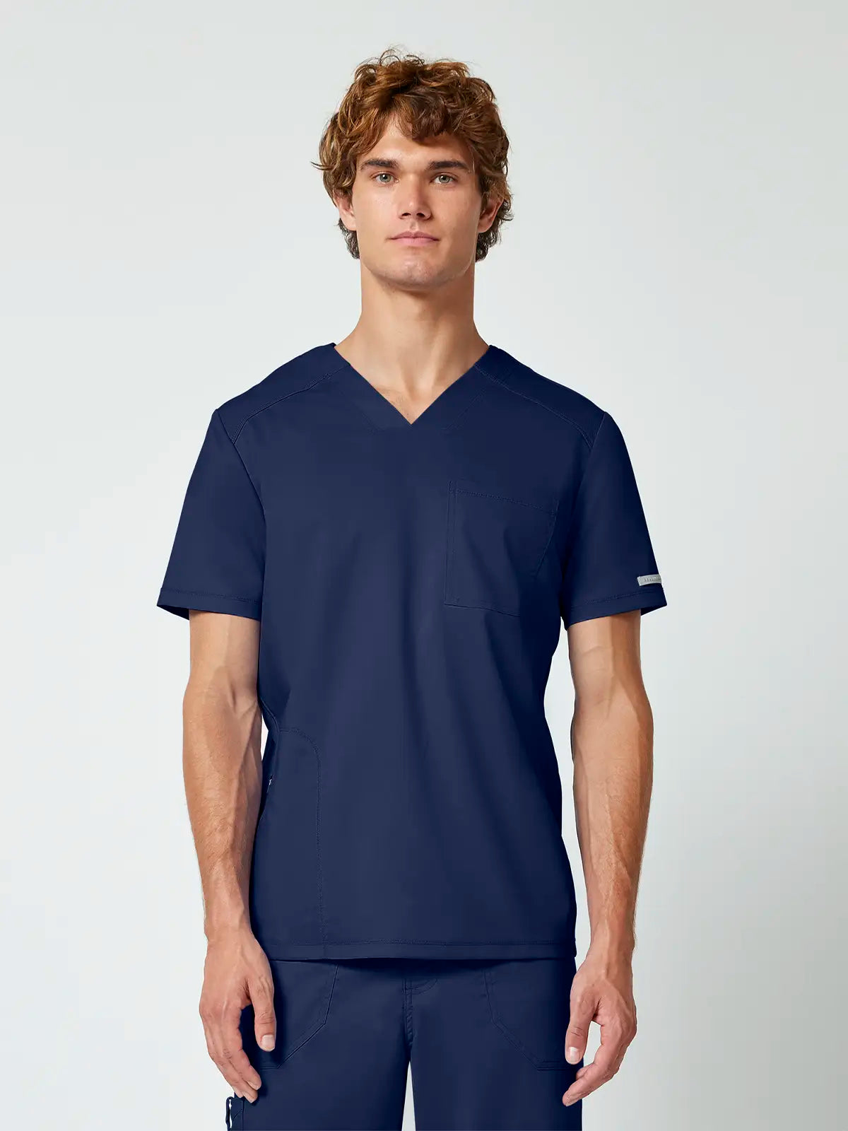 Casaca sanitaria hombre cuello pico Cherokee Revolution WWE603